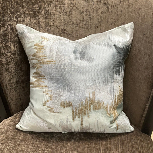 Blue and gold pillow